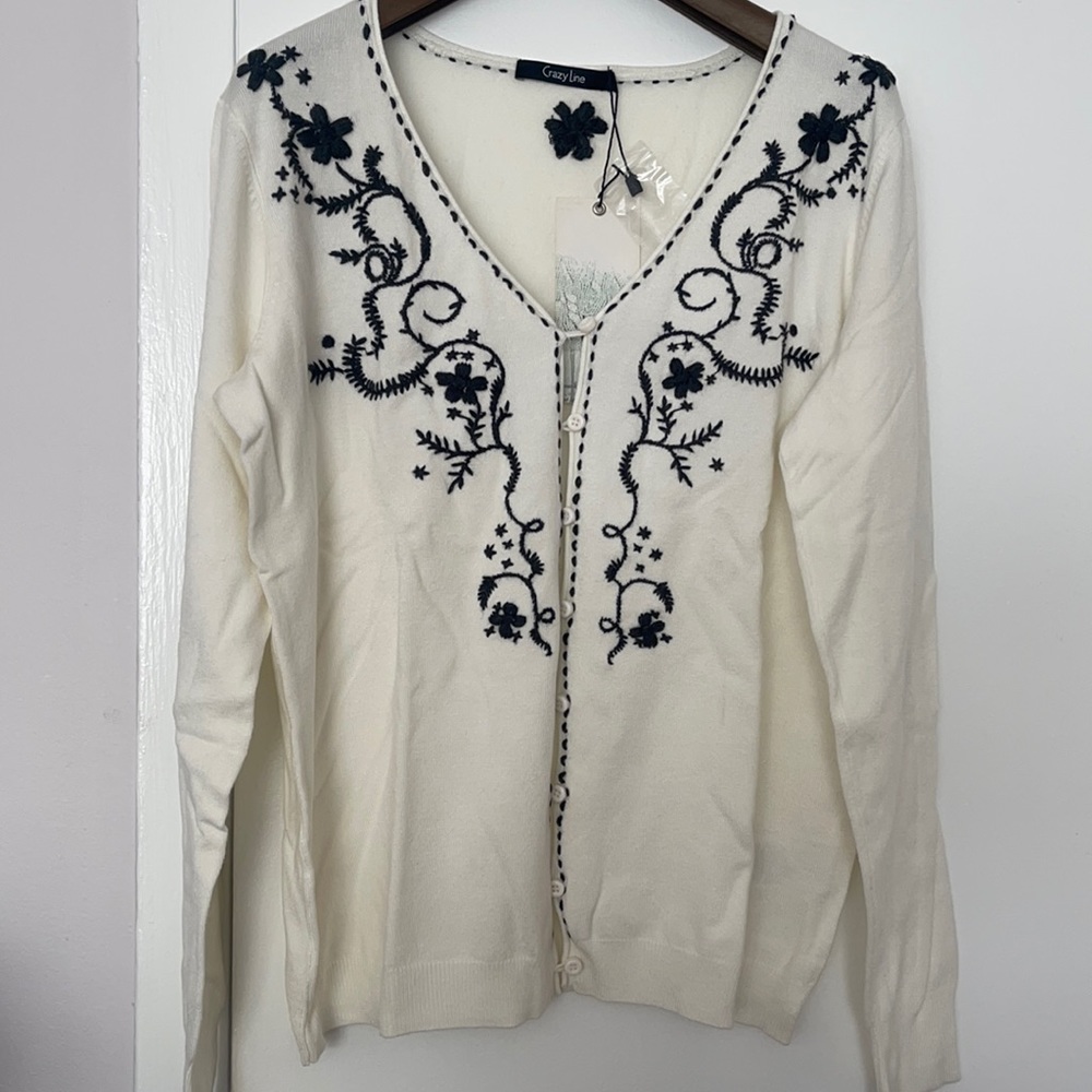 NWT embroidered white cardigan.